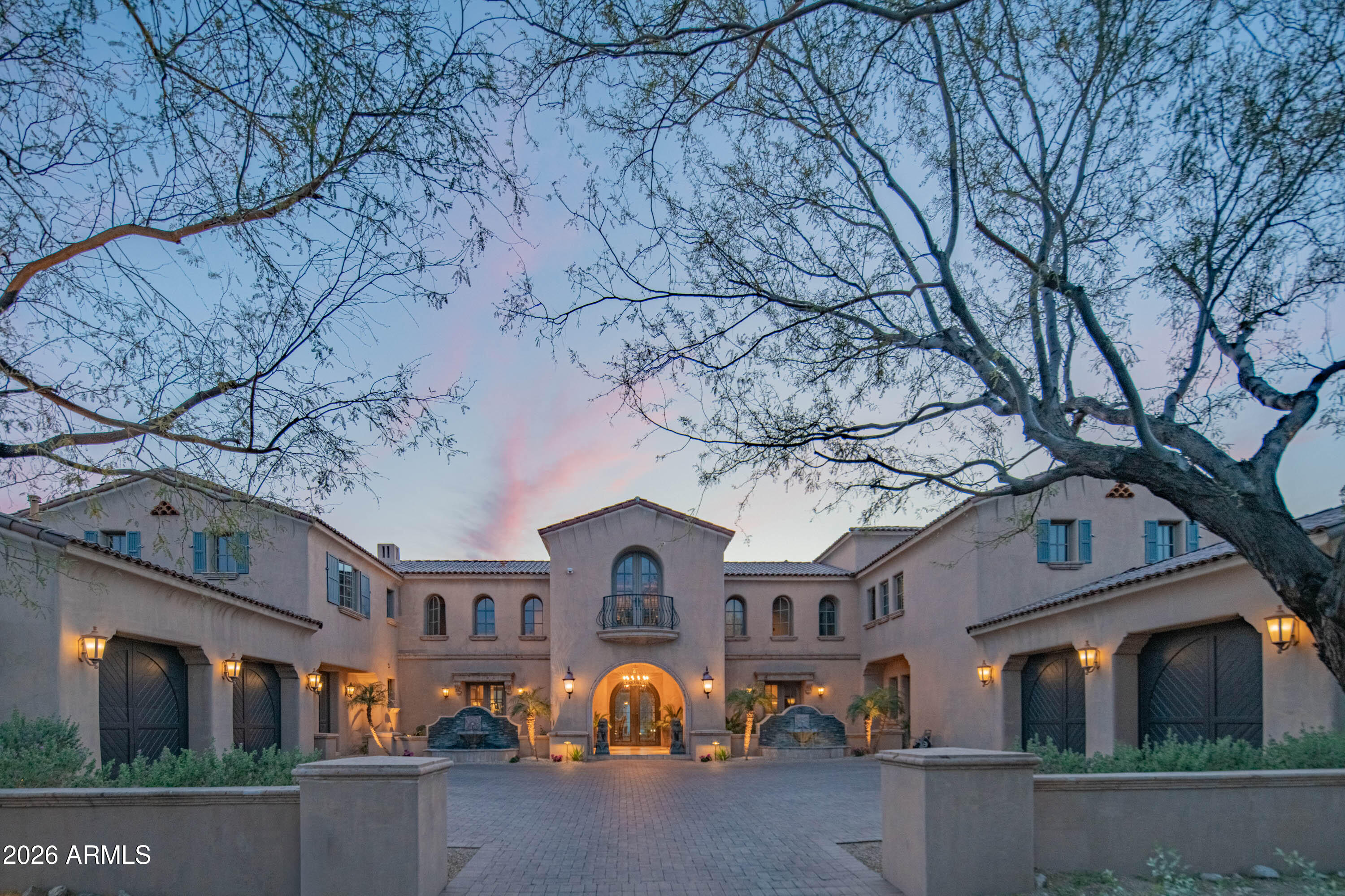 21401 West Granite Ridge Road Buckeye, AZ 85396 - Photo 142 of 144 a front view of a building with lots of trees