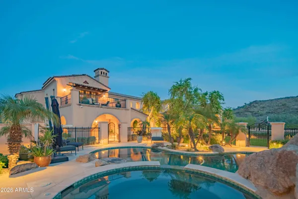 a view of a house with a swimming pool