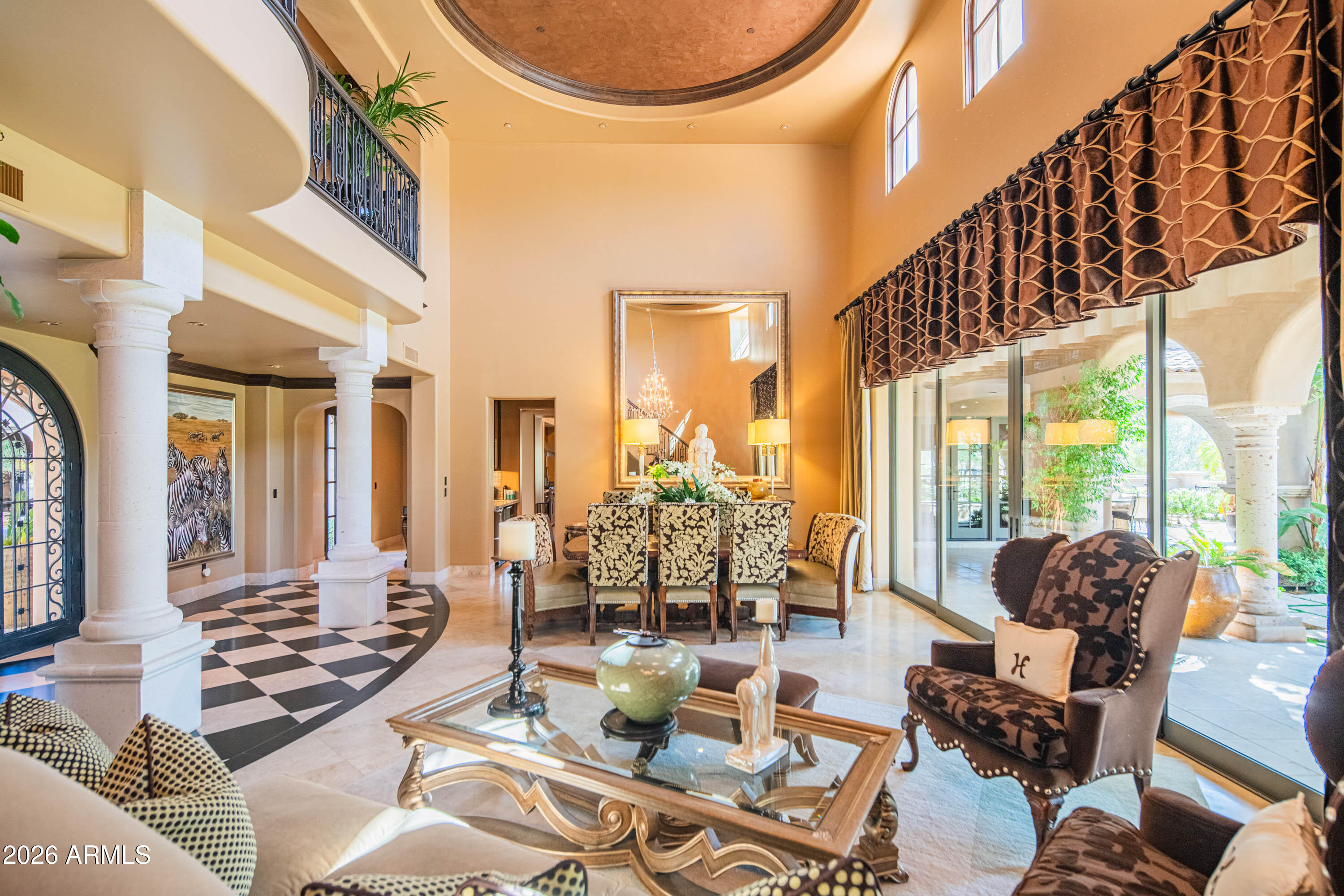 21401 West Granite Ridge Road Buckeye, AZ 85396 - Photo 25 of 144 a living room with furniture and a large window