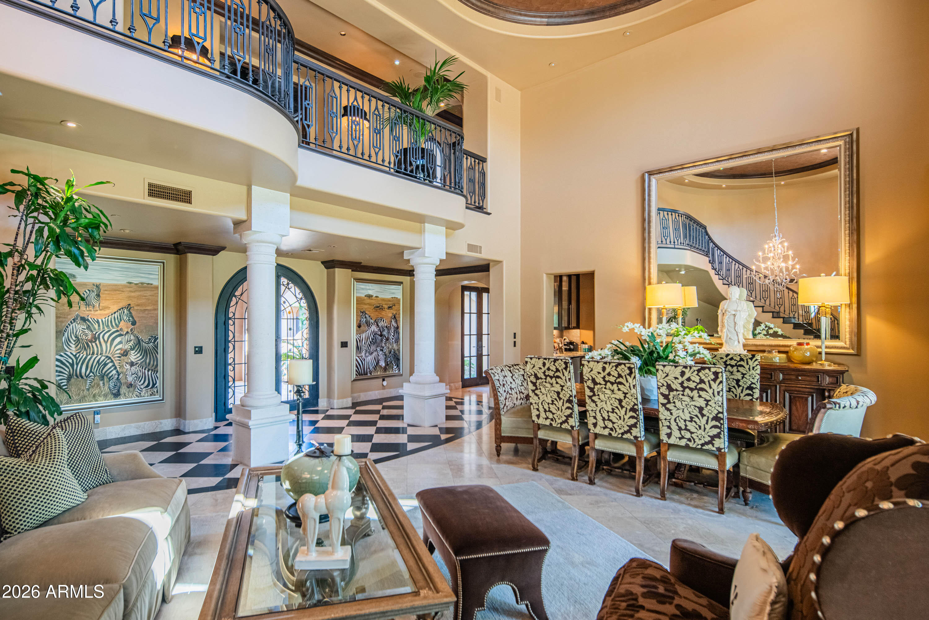 21401 West Granite Ridge Road Buckeye, AZ 85396 - Photo 26 of 144 a view of a patio with couches table and chairs and potted plants