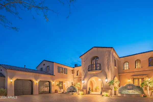 an aerial view of residential houses and outdoor space