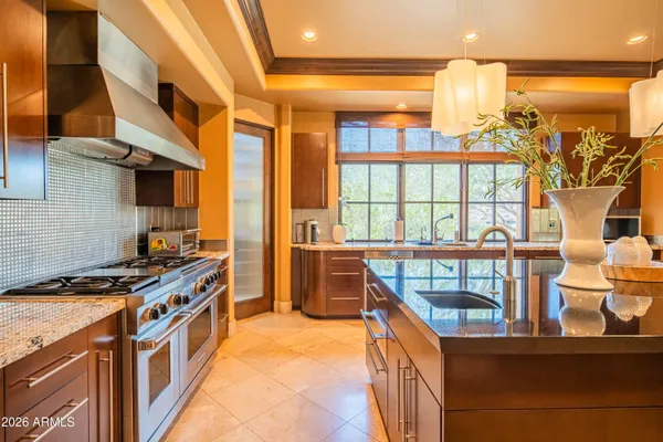 an aerial view of residential house and green space