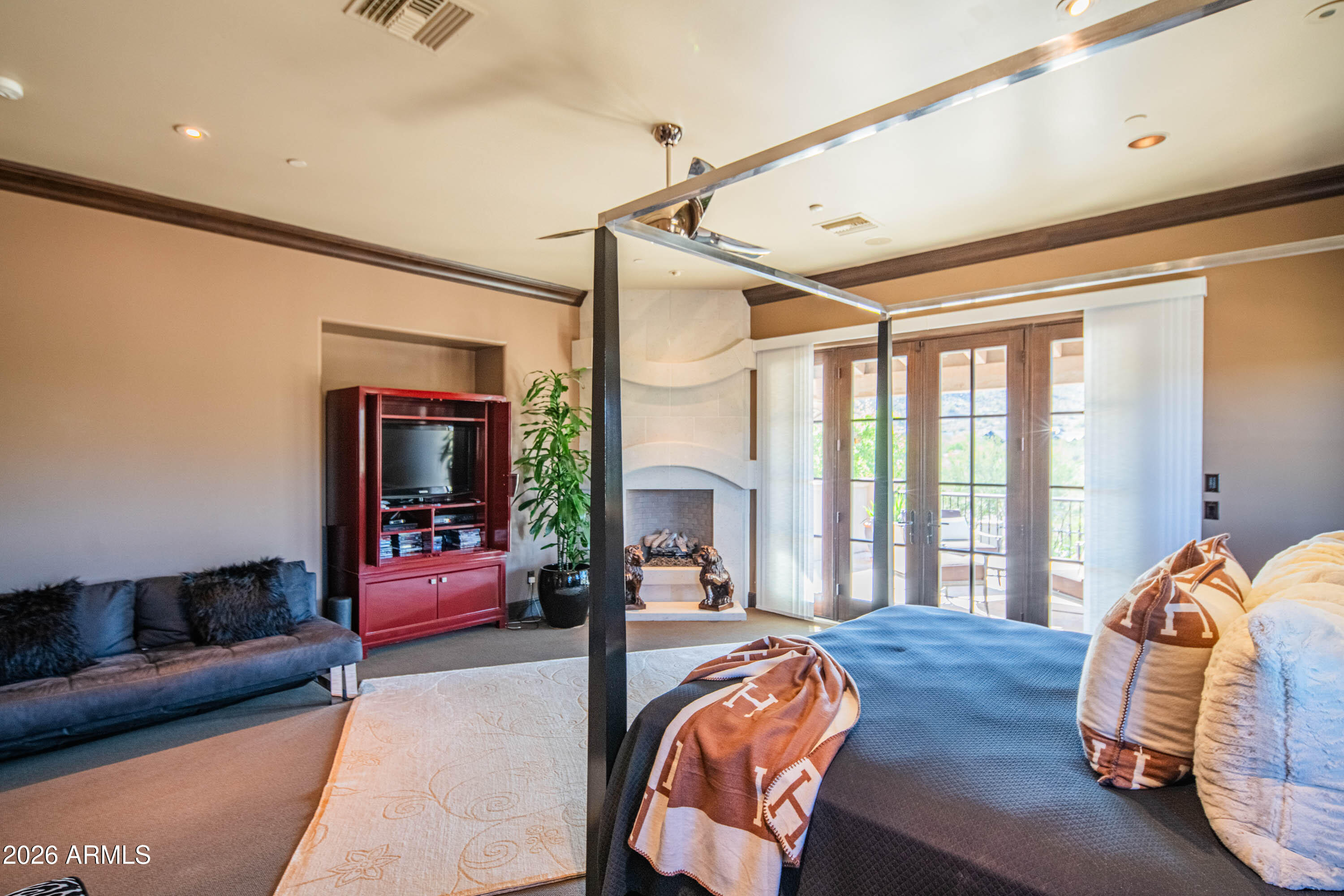 21401 West Granite Ridge Road Buckeye, AZ 85396 - Photo 42 of 144 a bed room with furniture and a window