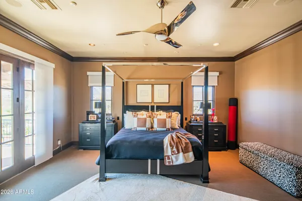 a view of a livingroom with furniture and a ceiling fan