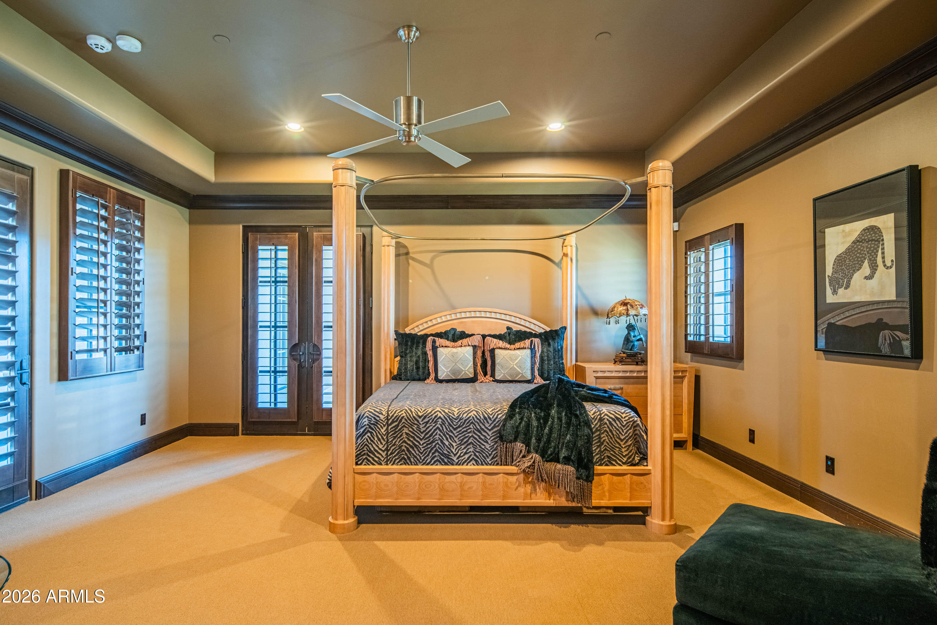 21401 West Granite Ridge Road Buckeye, AZ 85396 - Photo 48 of 144 a bedroom with furniture and large window