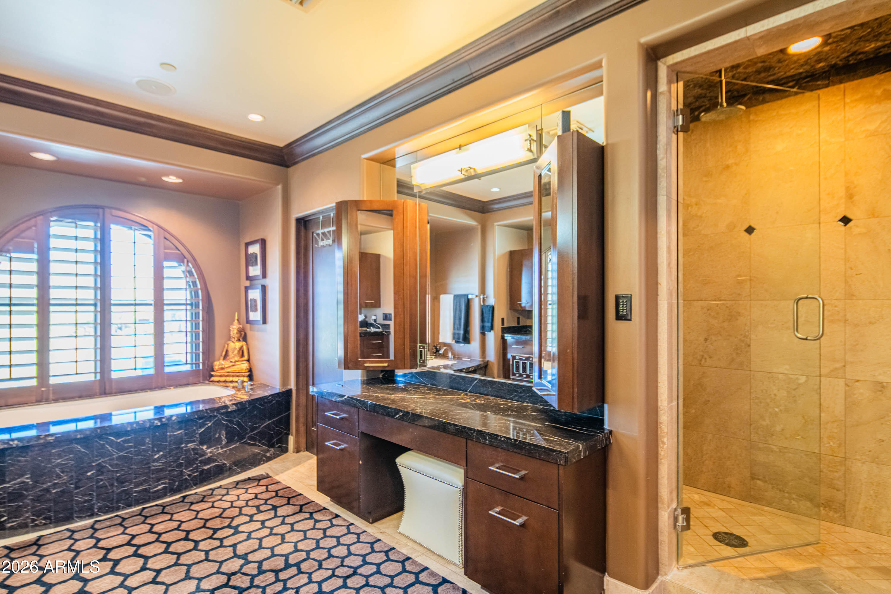 21401 West Granite Ridge Road Buckeye, AZ 85396 - Photo 49 of 144 a bathroom with a granite countertop sink a mirror and a shower