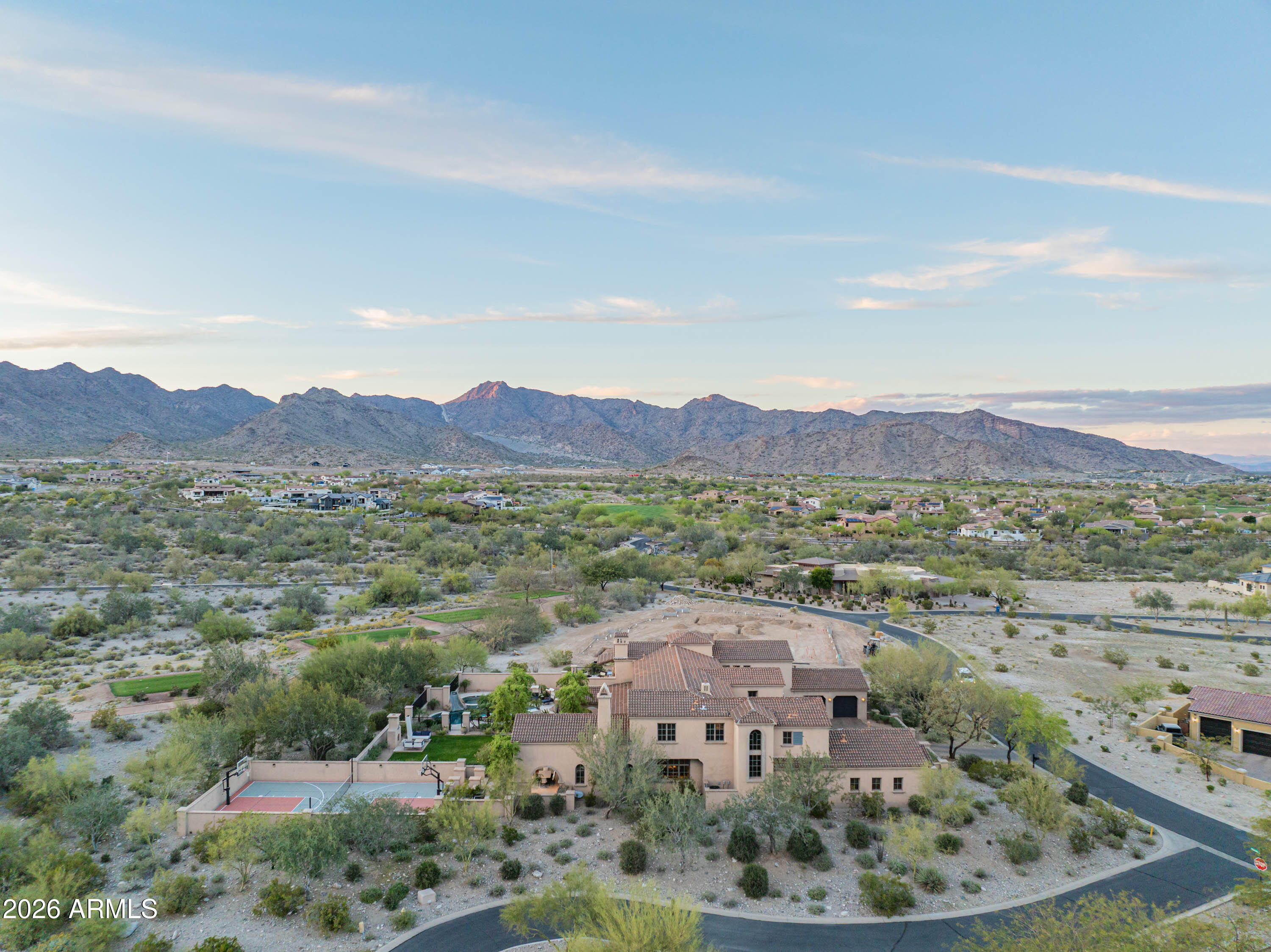 21401 West Granite Ridge Road Buckeye, AZ 85396 - Photo 95 of 144 an aerial view of residential house and sandy dunes