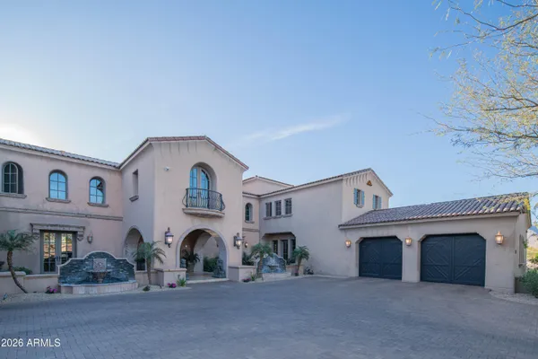 a kitchen with kitchen island granite countertop a large window and a counter space