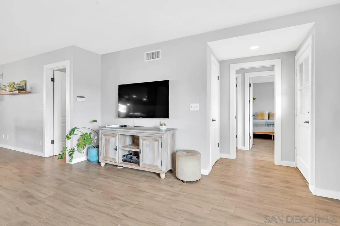 13415 Pequot Drive Poway, CA 92064 - Photo 20 of 63 a view of living room filled with furniture and flat screen tv