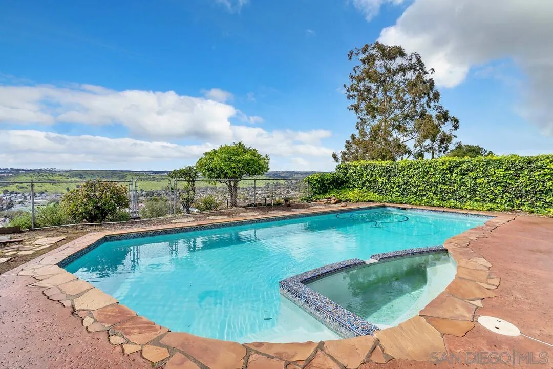 13415 Pequot Drive Poway, CA 92064 - Photo 34 of 63 a view of a swimming pool with a yard