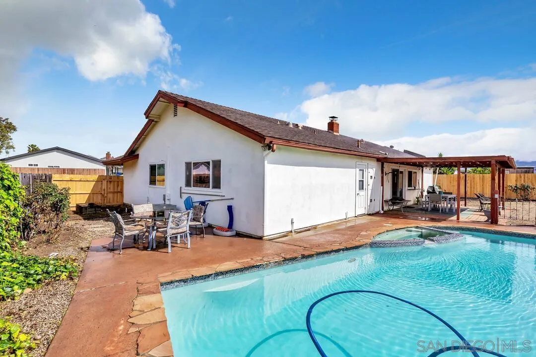 13415 Pequot Drive Poway, CA 92064 - Photo 38 of 63 a view of a house with swimming pool and sitting area