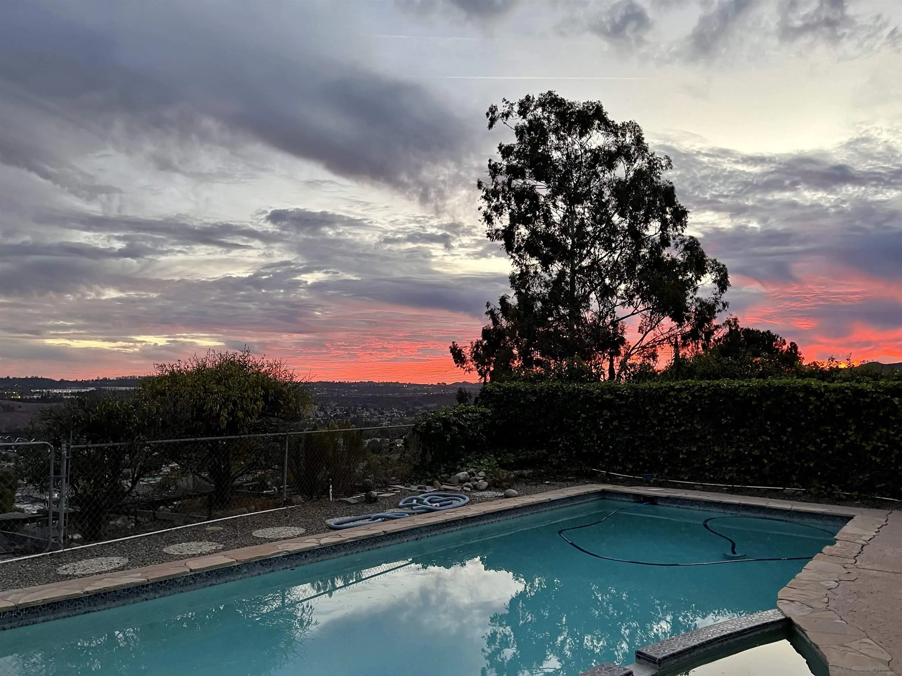 13415 Pequot Drive Poway, CA 92064 - Photo 63 of 63 a view of a swimming pool with a yard and sitting area