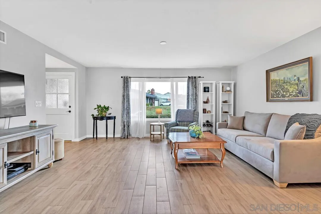 13415 Pequot Drive Poway, CA 92064 - Photo 10 of 63 a living room with furniture and a fireplace