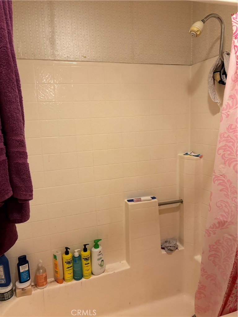 133 Cannon Road Riverside, CA 92506 - Photo 19 of 32 a bathroom with a shower