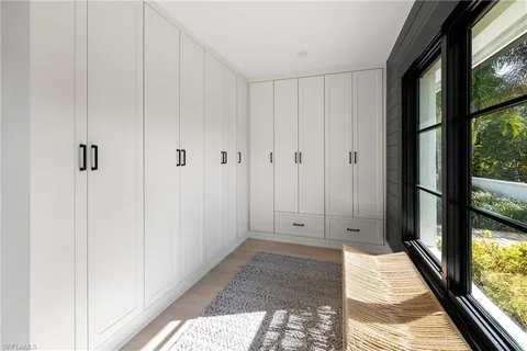 a view of bathroom with shower and window