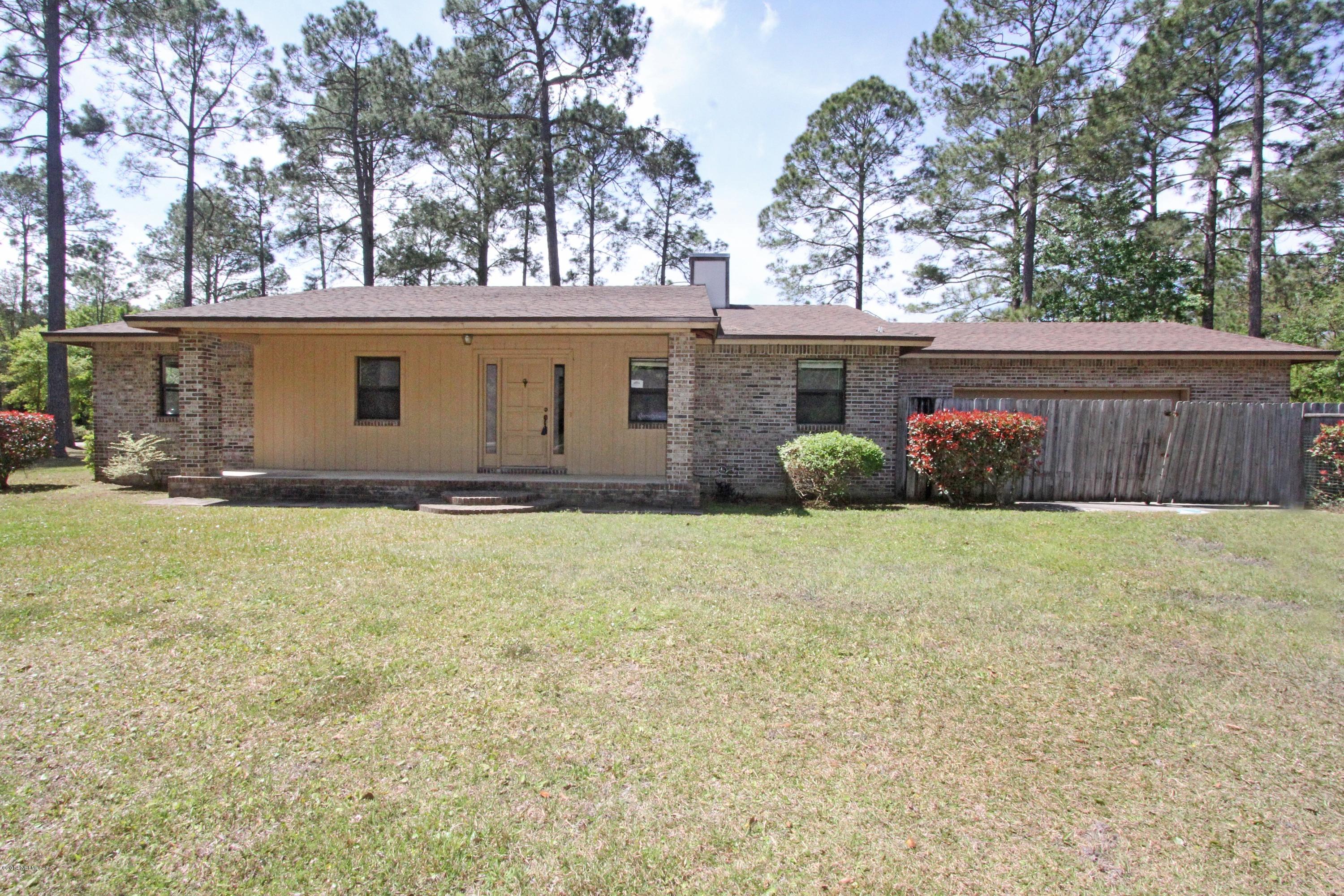 54421 Sheffield Road Callahan, FL 32011 - Photo 1 of 16 front view of a house with a yard
