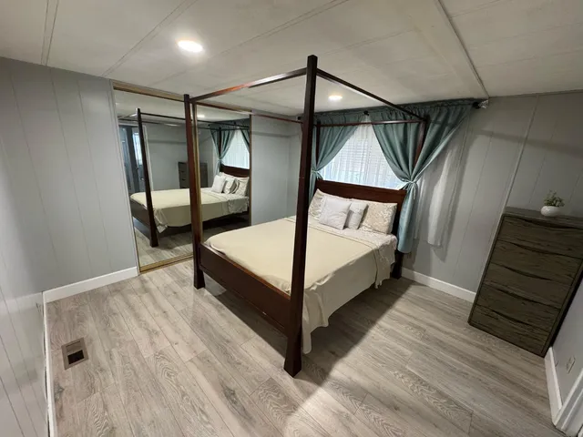 a view of a hallway with staircase