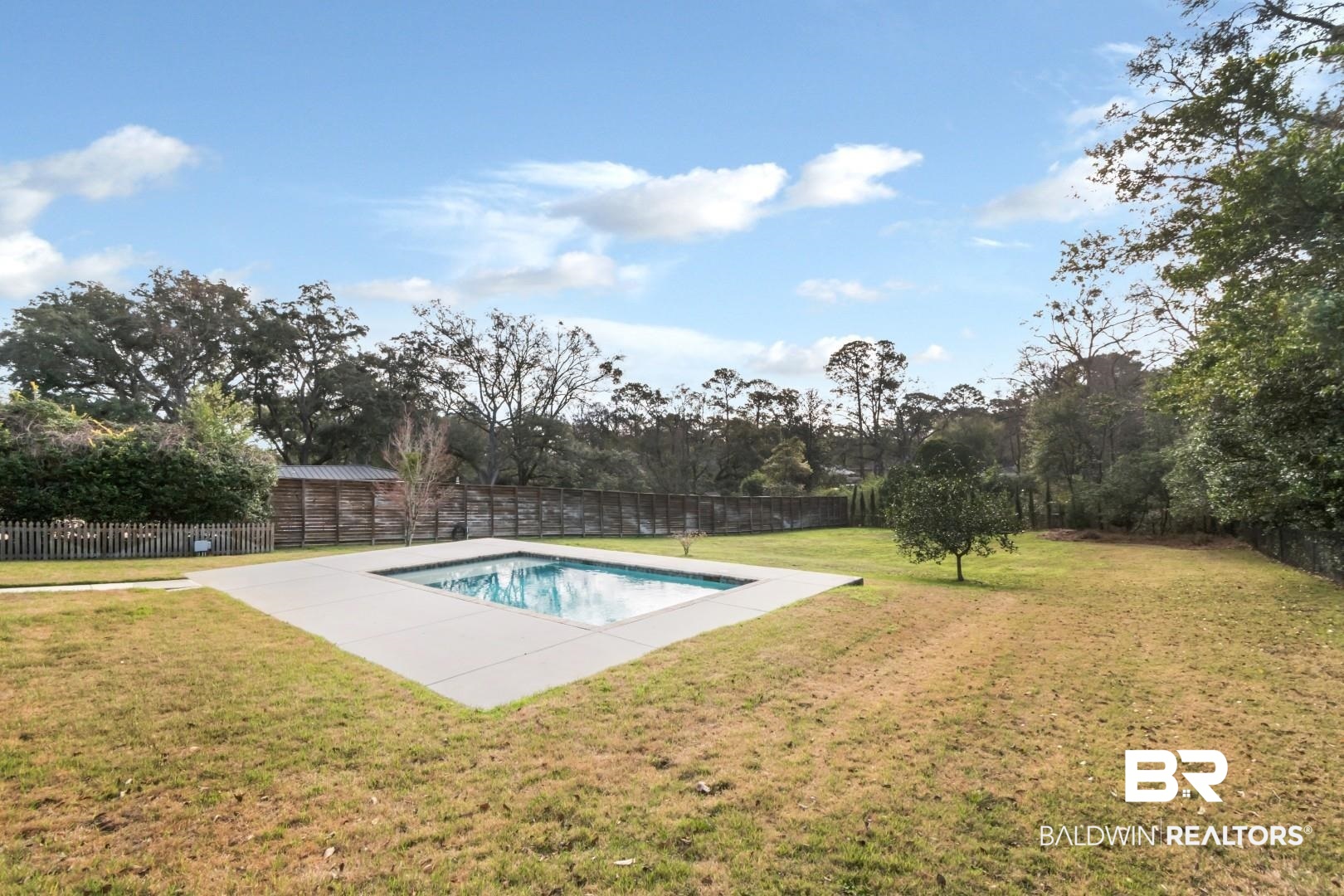 231 Rochester Road Mobile, AL 36608 - Photo 45 of 51 View of pool with a fenced backyard and patio surround