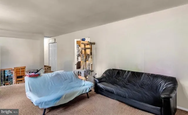 a living room with a couch and a couch