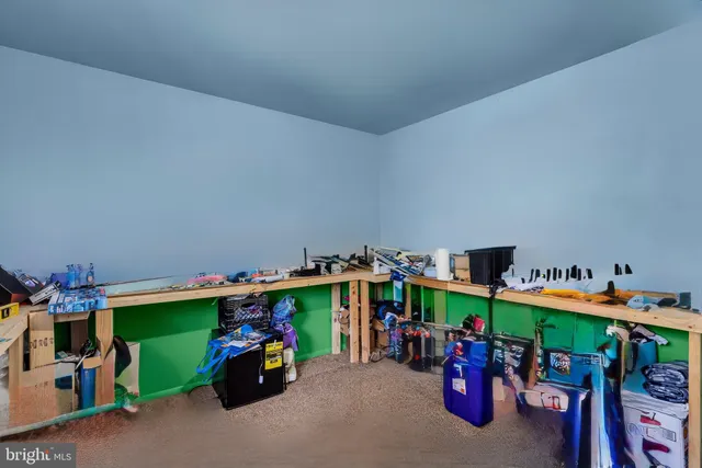 a children room with furniture and toys