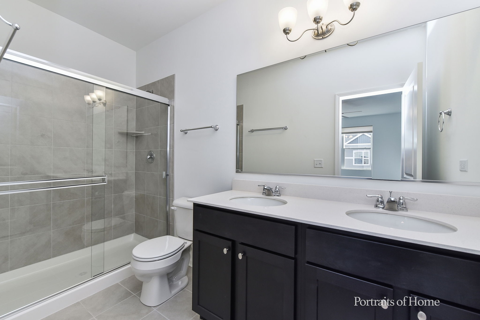 4273 Chelsea Mnr Circle Aurora, IL 60504 - Photo 14 of 23 a bathroom with a sink a toilet and shower