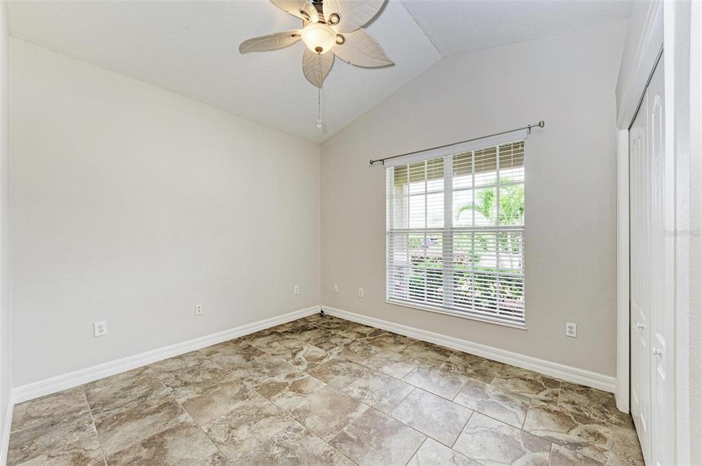 337 Snapdragon Loop Bradenton, FL 34212 - Photo 21 of 54 a view of an empty room with a window