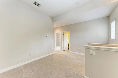 an empty room with closet area