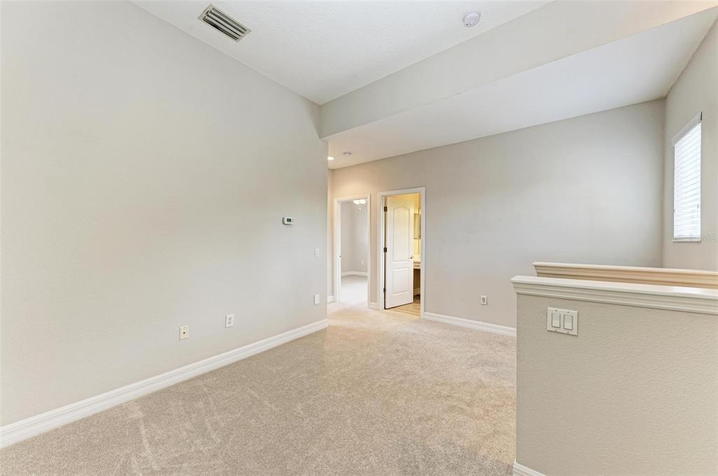 337 Snapdragon Loop Bradenton, FL 34212 - Photo 26 of 54 a view of an empty room with a window