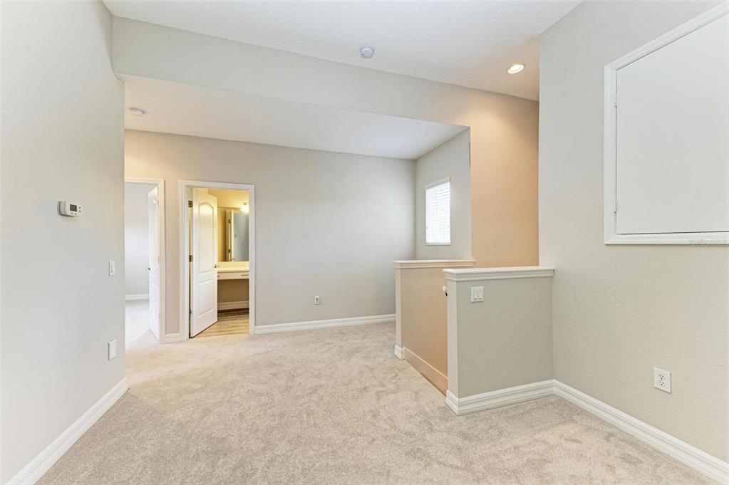 337 Snapdragon Loop Bradenton, FL 34212 - Photo 27 of 54 an empty room with windows and closet