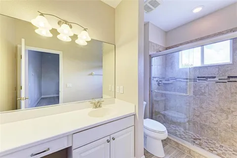 an aerial view of a house with a garden