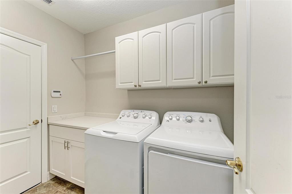 337 Snapdragon Loop Bradenton, FL 34212 - Photo 32 of 54 a utility room with dryer and washer