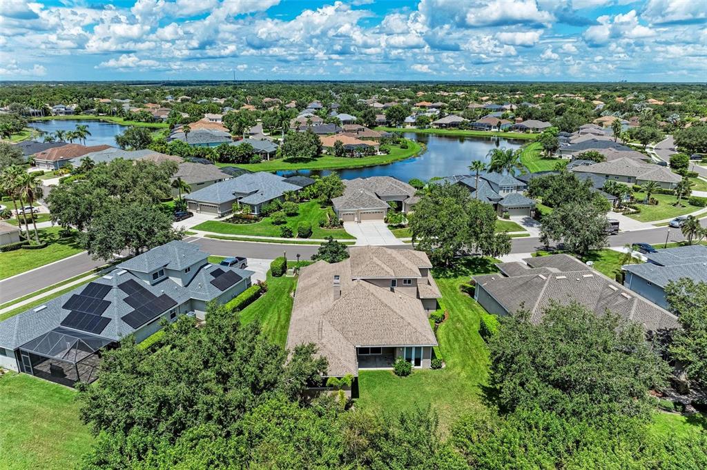 337 Snapdragon Loop Bradenton, FL 34212 - Photo 35 of 54 an aerial view of a house with a garden