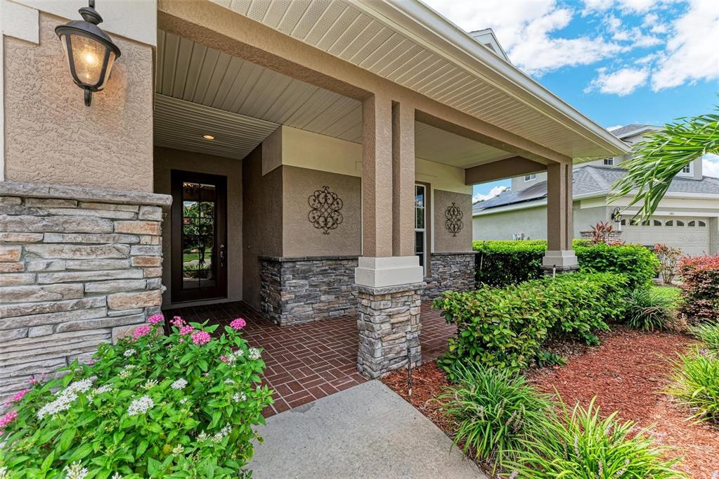 337 Snapdragon Loop Bradenton, FL 34212 - Photo 7 of 54 a front view of a house with a garden