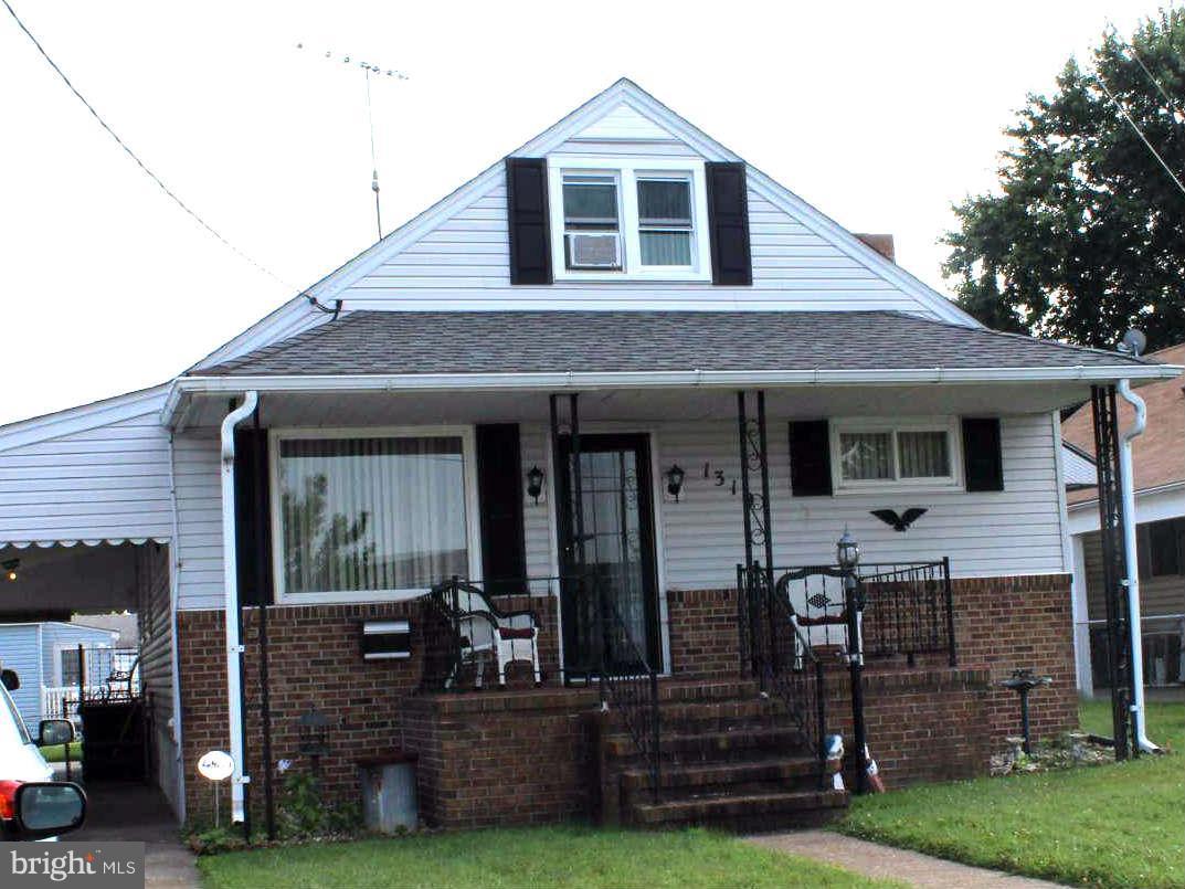 1319 North Point Road Dundalk, MD 21222 - Photo 2 of 24 a front view of a house with garden