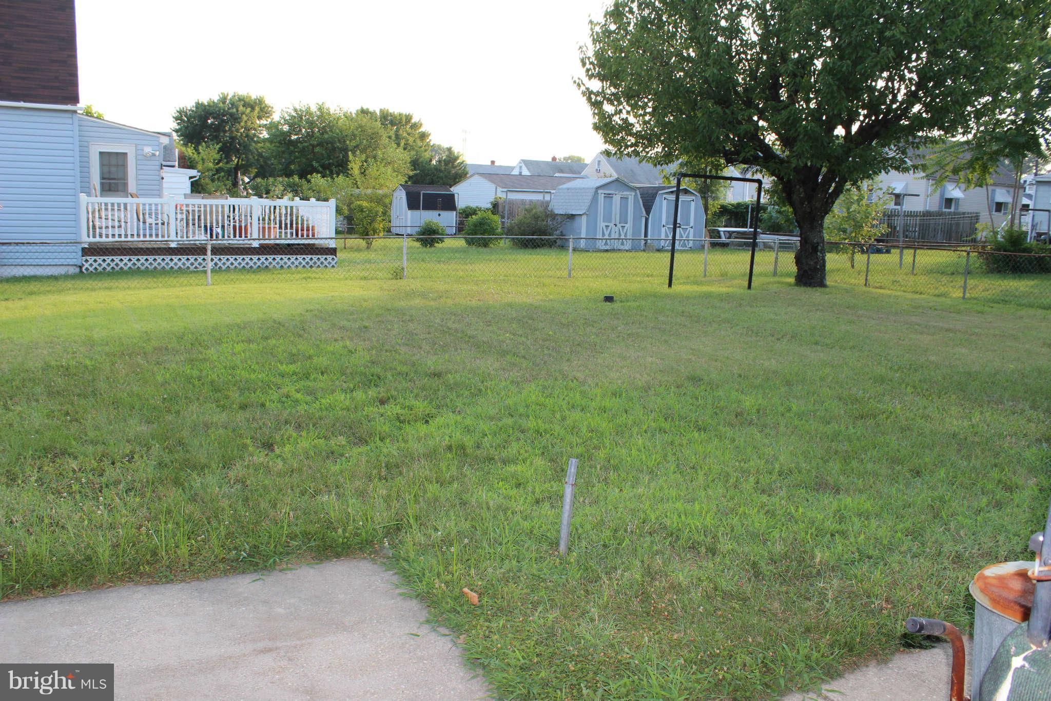 1319 North Point Road Dundalk, MD 21222 - Photo 22 of 24 a view of a big yard with a house