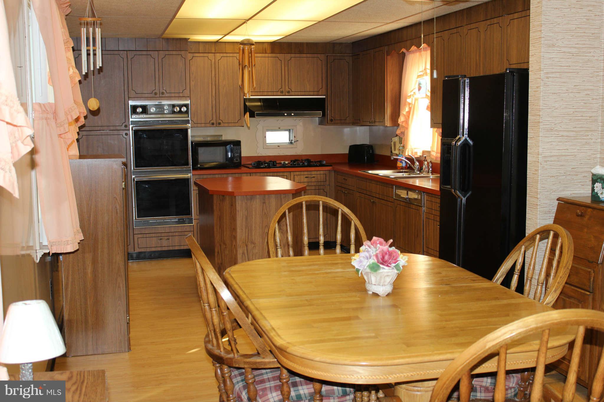 1319 North Point Road Dundalk, MD 21222 - Photo 9 of 24 a view of a dining room with furniture