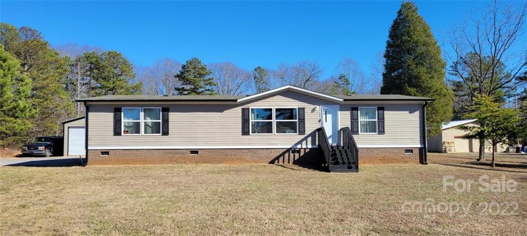 232 Jim Patterson Road Kings Mountain, NC 28086 - Photo 1 of 13 front view of a house with a yard