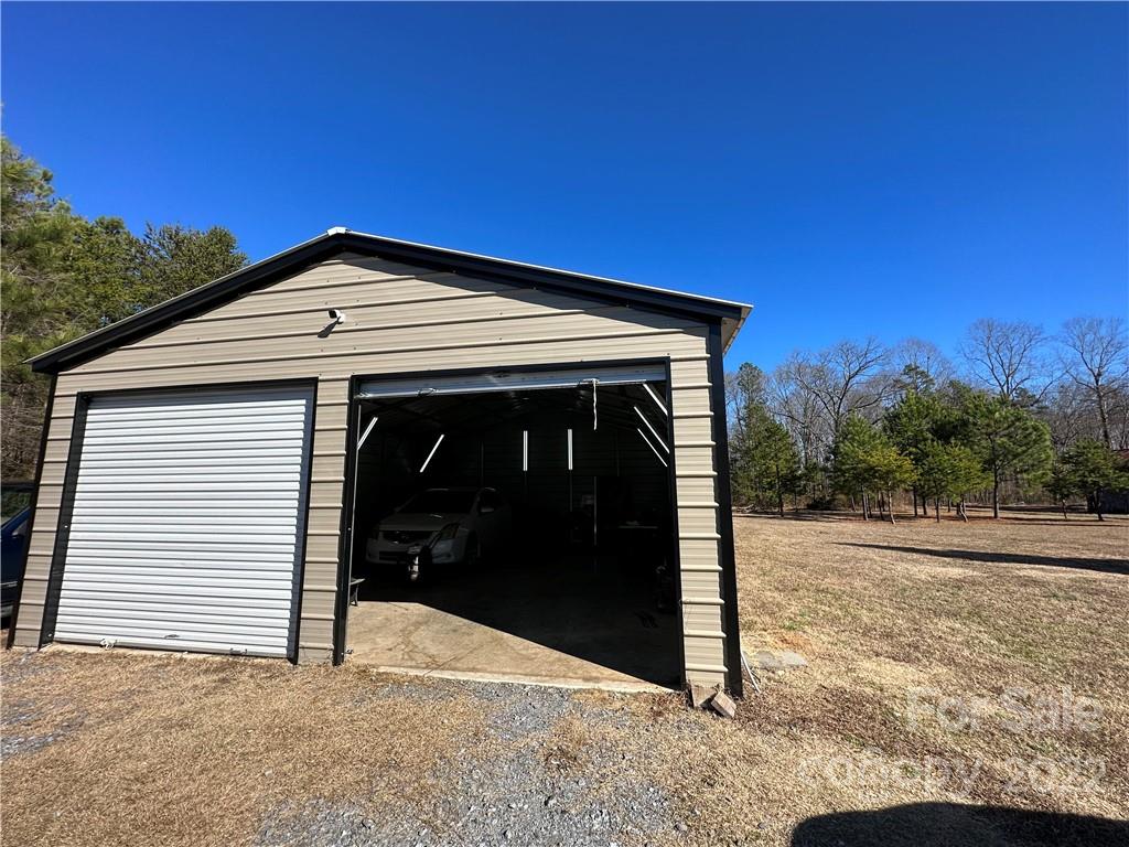 232 Jim Patterson Road Kings Mountain, NC 28086 - Photo 12 of 13 a view of a house with a garage