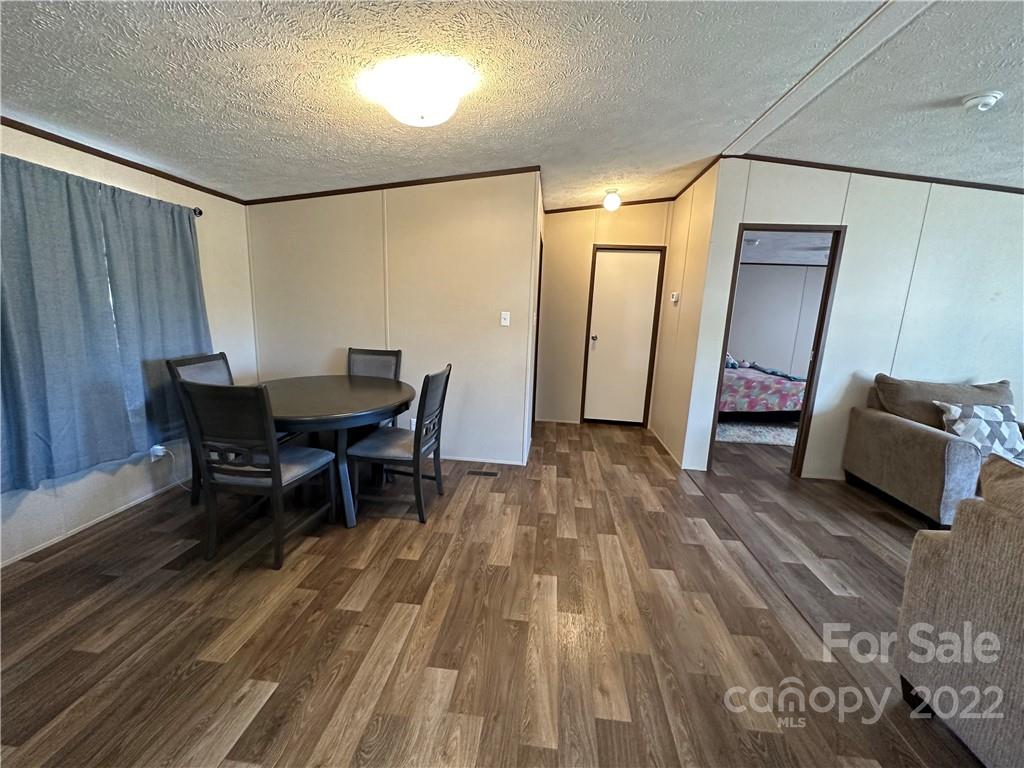 232 Jim Patterson Road Kings Mountain, NC 28086 - Photo 3 of 13 a view of a room with furniture and wooden floor