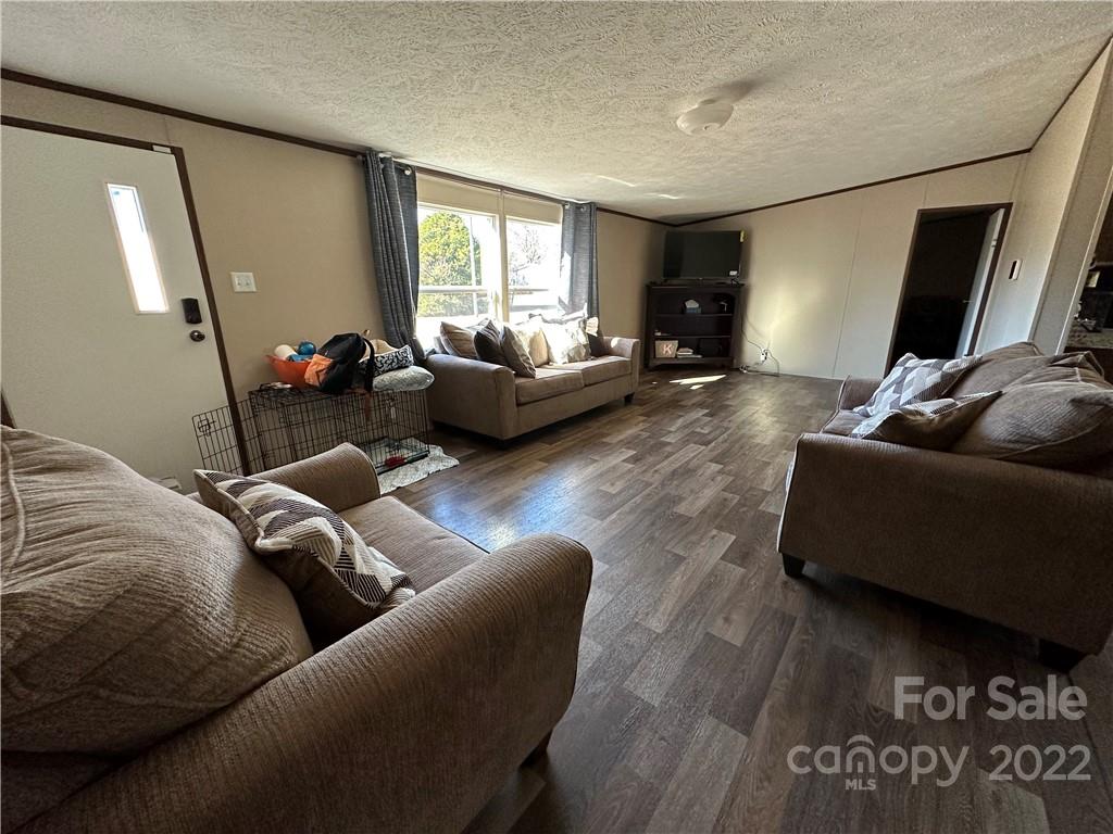 232 Jim Patterson Road Kings Mountain, NC 28086 - Photo 5 of 13 a living room with furniture and a couch