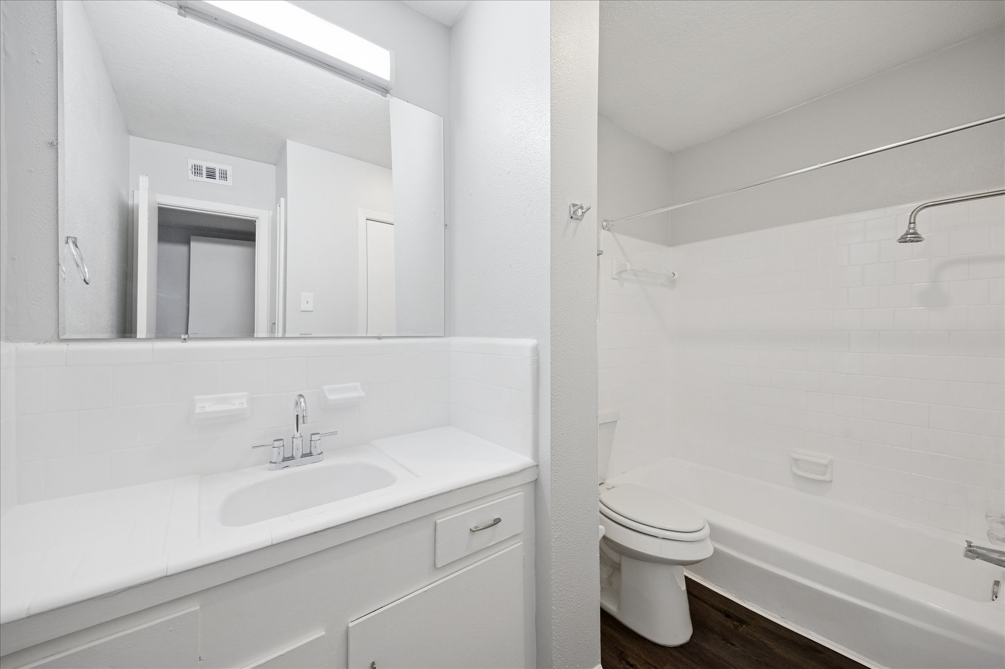 1645 West Main Street, Unit 9 Houston, TX 77006 - Photo 12 of 12 a bathroom with a sink toilet and shower