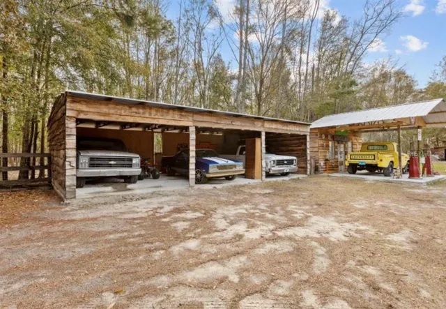 a view of a car park in front of house