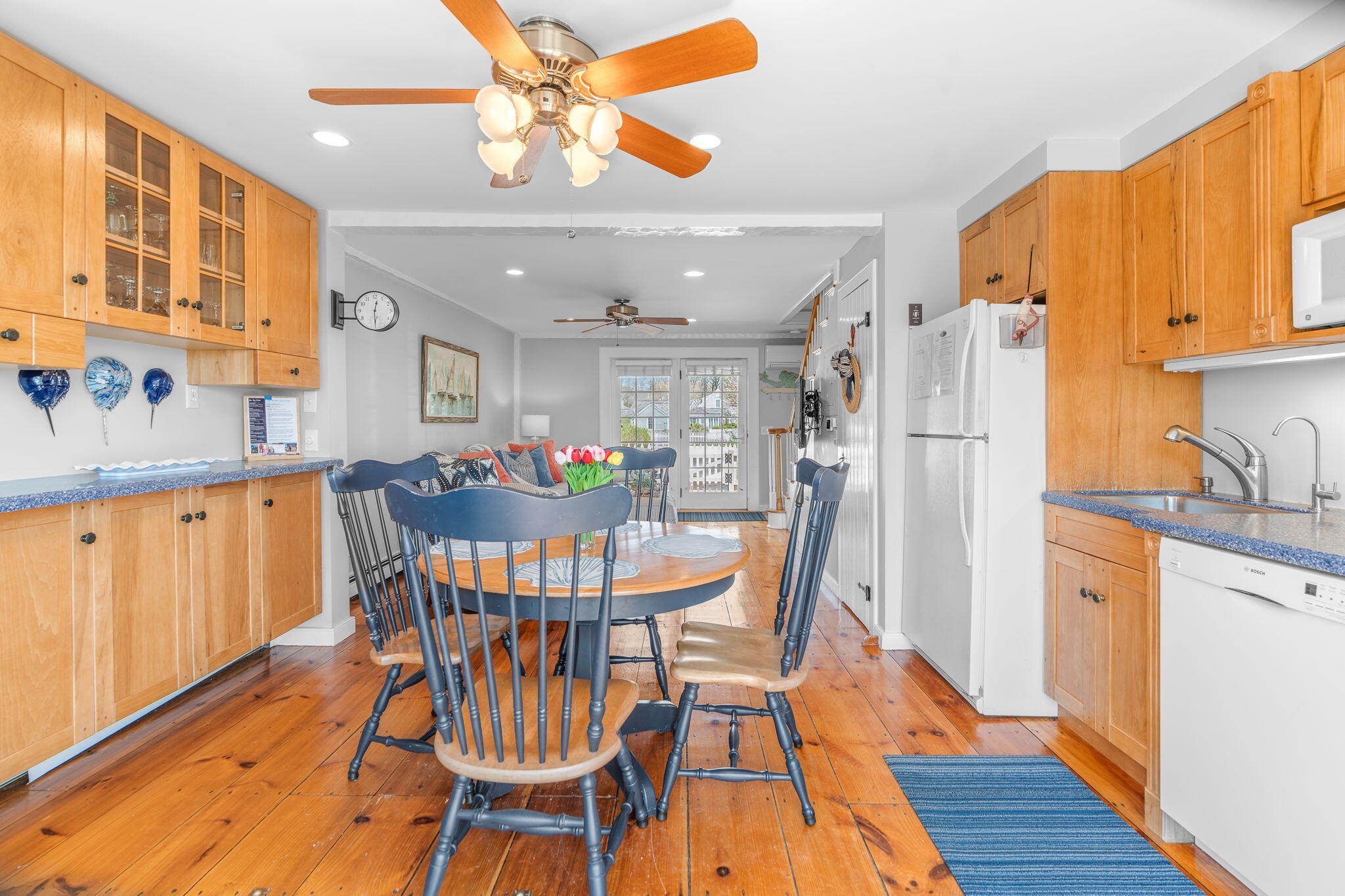 4 Race Point Road, Unit 4 Mashpee, MA 02649 - Photo 12 of 43 a view of a dining room with furniture window and wooden floor