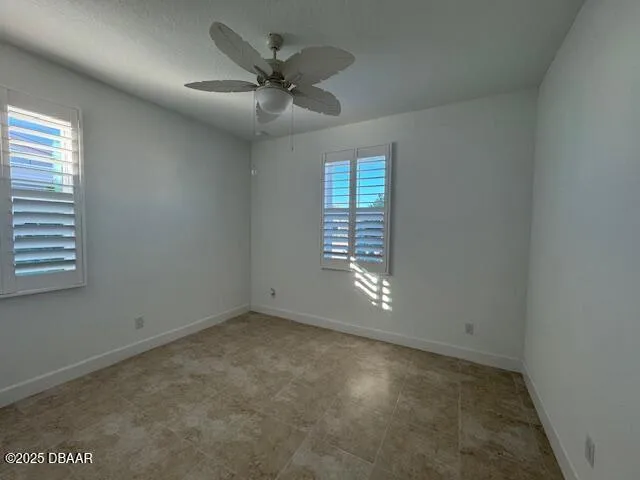 a bathroom with a double vanity sink toilet mirror and shower