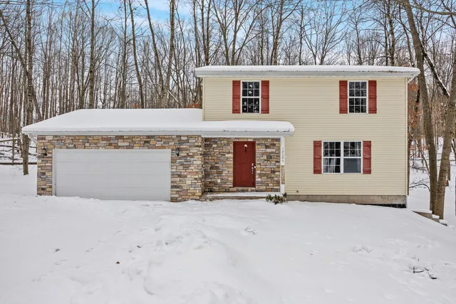 $289,900 | 12095 Dubois Drive, Canadian Lakes, MI 49346
