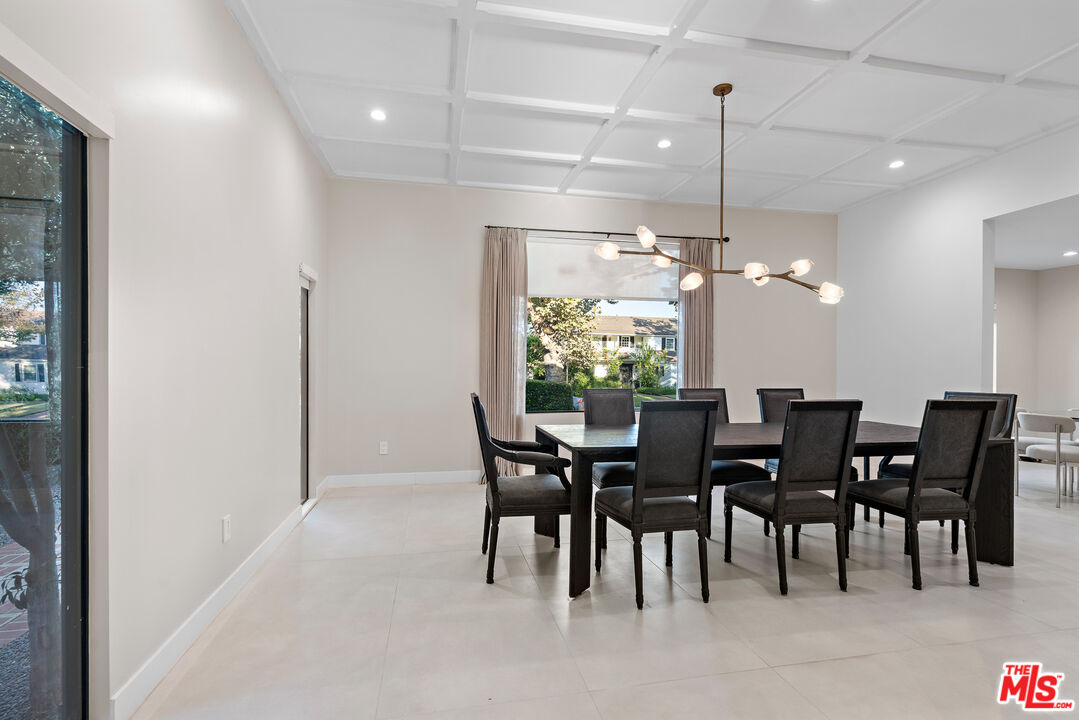 201 South Bedford Drive Beverly Hills, CA 90212 - Photo 14 of 37 a view of a dining room with furniture window and outside view