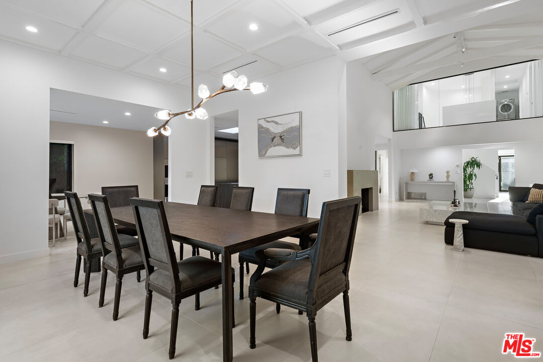 201 South Bedford Drive Beverly Hills, CA 90212 - Photo 15 of 37 a view of a dining room with furniture
