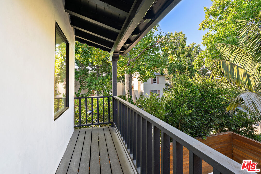 201 South Bedford Drive Beverly Hills, CA 90212 - Photo 35 of 37 a view of balcony with wooden floor