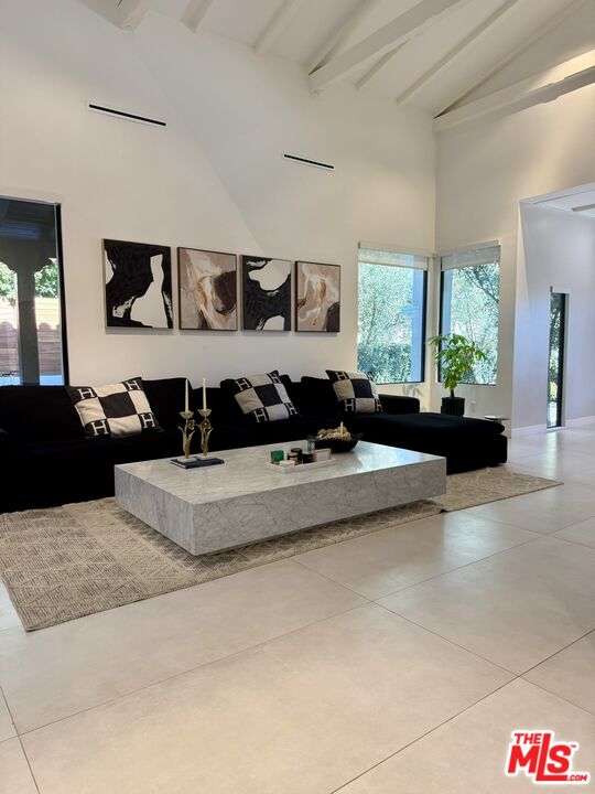 201 South Bedford Drive Beverly Hills, CA 90212 - Photo 9 of 37 a living room with furniture flowerpot and window