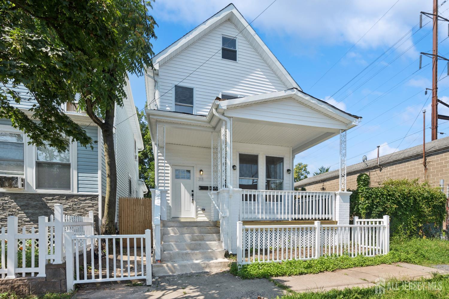 front view of a house with a small yard